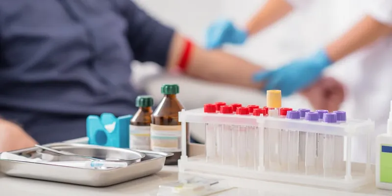 Blood sample tubes being prepared in a lab